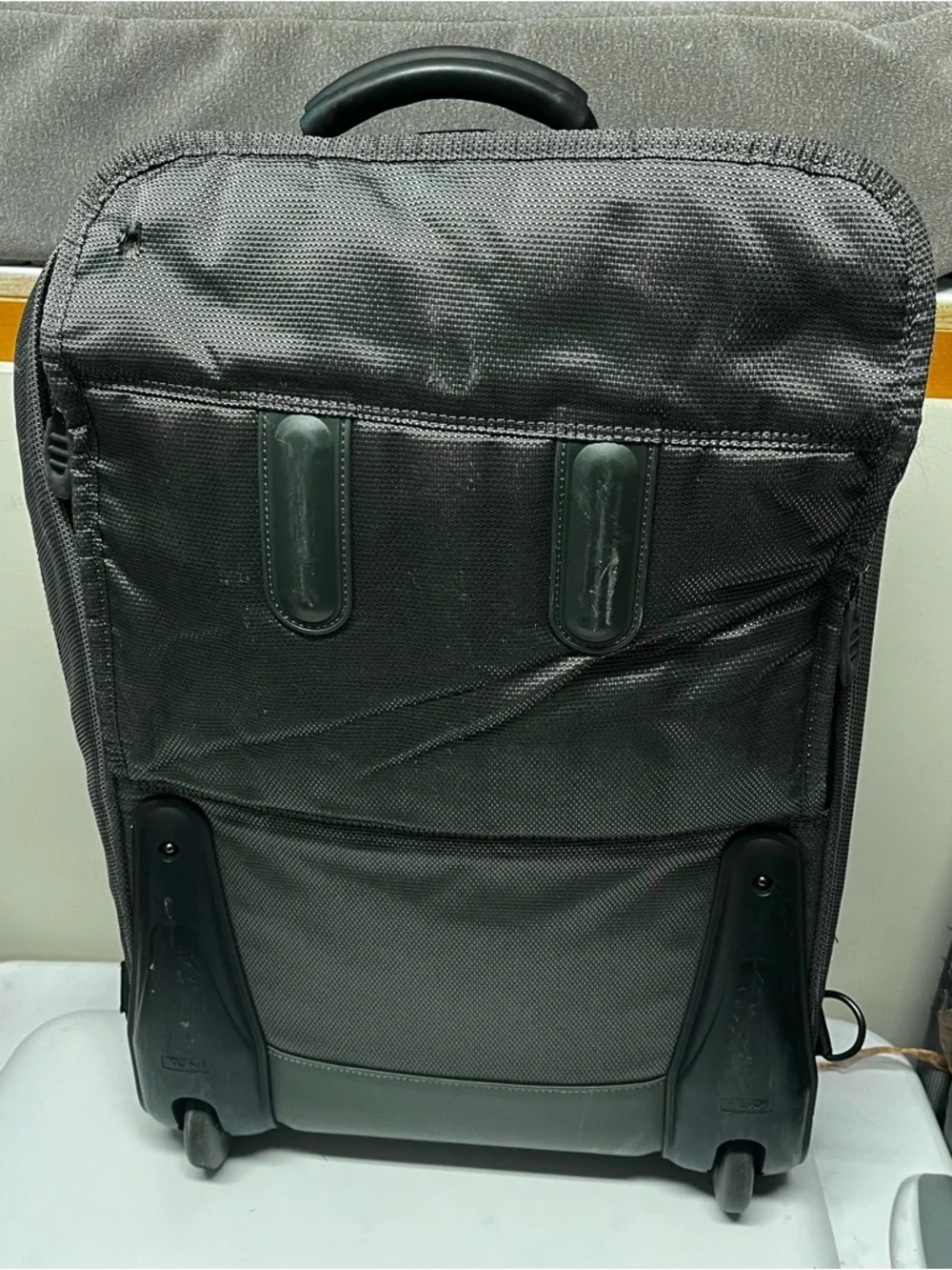 TUMI Olive Green Travel Backpack - Durable Carry-On Bag